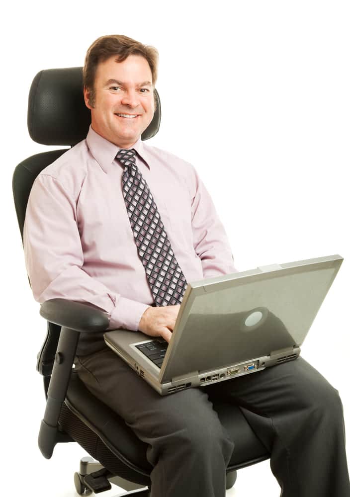 man sitting in comfortable chair