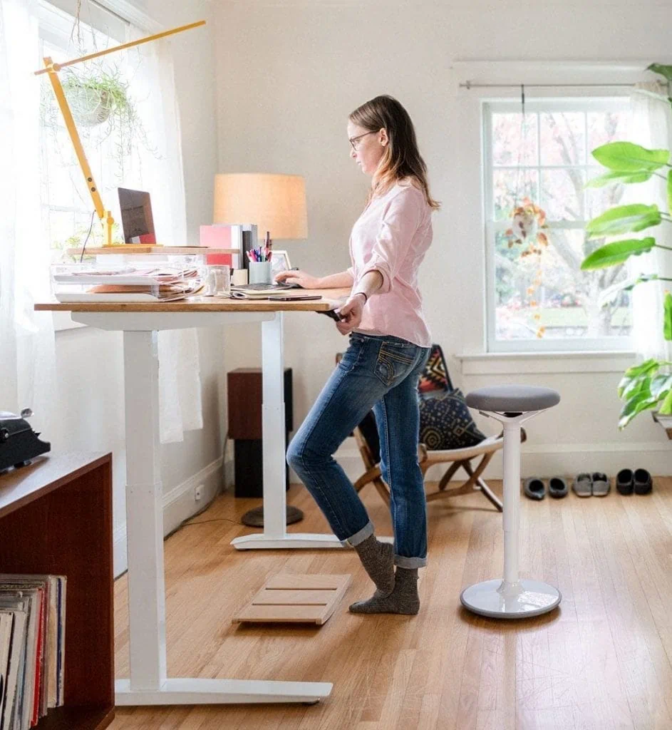 woman in front of fully jarvis bamboo desk